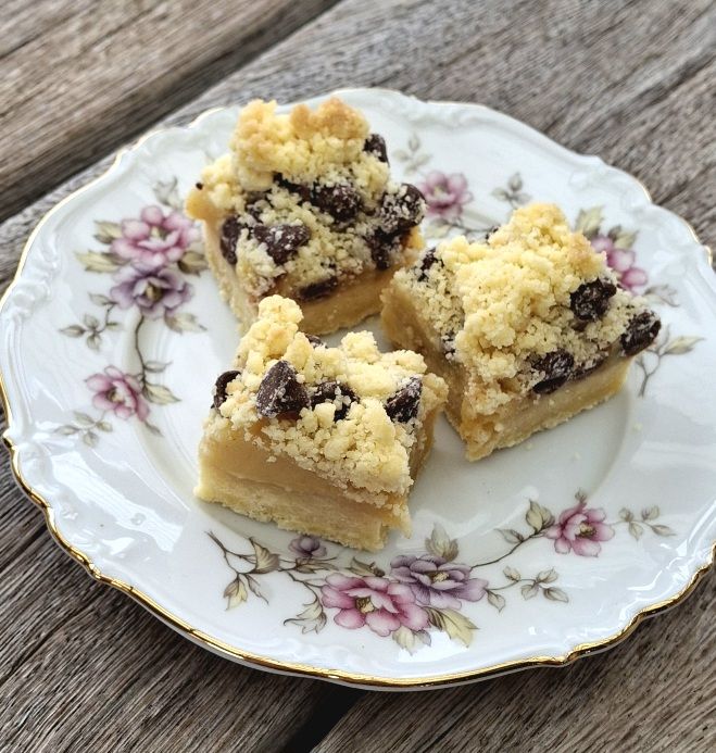 Pieces of Tan Slice served on a vintage floral-patterned plate with scalloped edges.